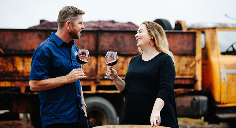 Two people enjoying Austin's wines